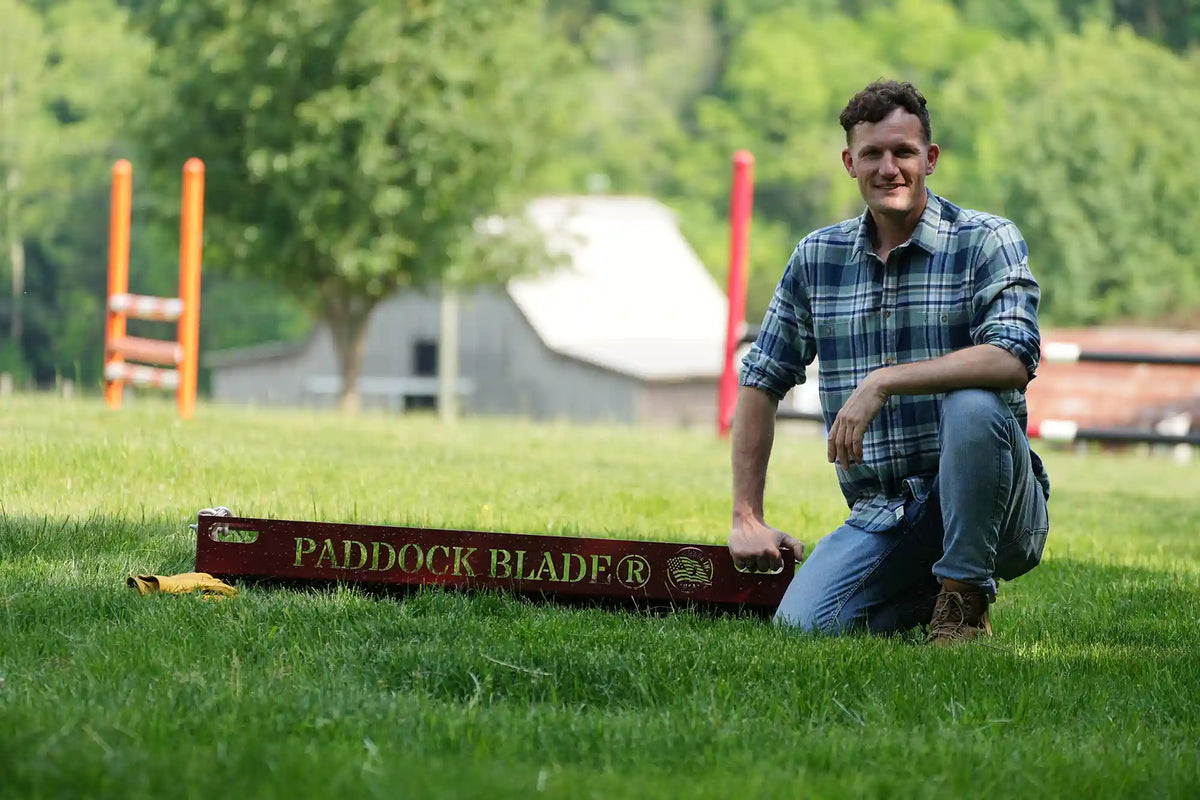 paddock blade being held by a man